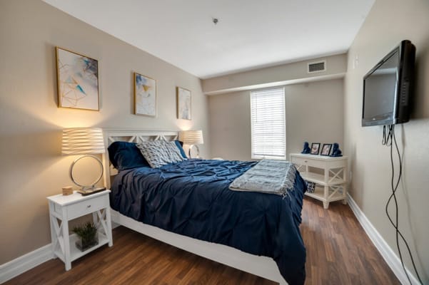 Cozy private room with a bed and TV