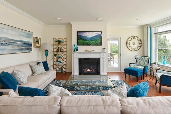 Bright and inviting common area with a fireplace