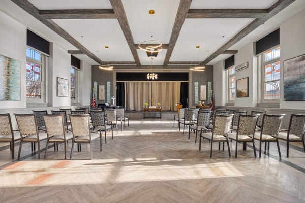 Bright common area with chairs and decor