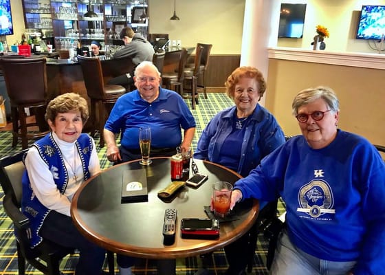 Residents enjoying drinks in a common area