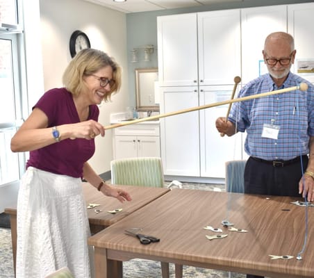 Residents participating in an activity with staff