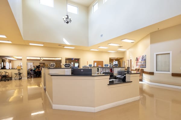 Bright and spacious lobby area with seating and activity setup