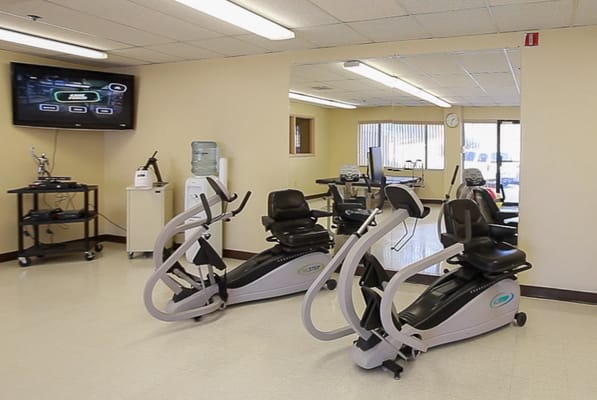 Interior view of a fitness room with exercise equipment