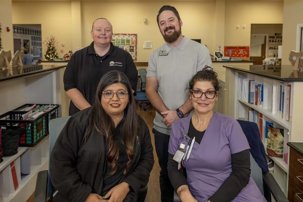 Staff members in the facility's common area
