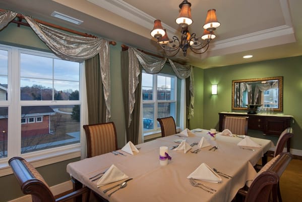 Dining area with set tables and elegant lighting