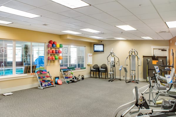 Interior view of a fitness area with exercise equipment