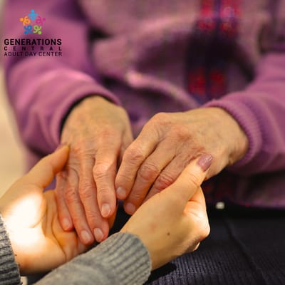 Elderly hands being held in a gentle gesture
