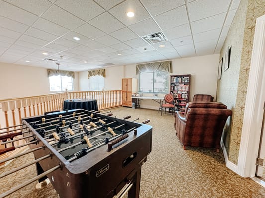 Common area with foosball table and seating