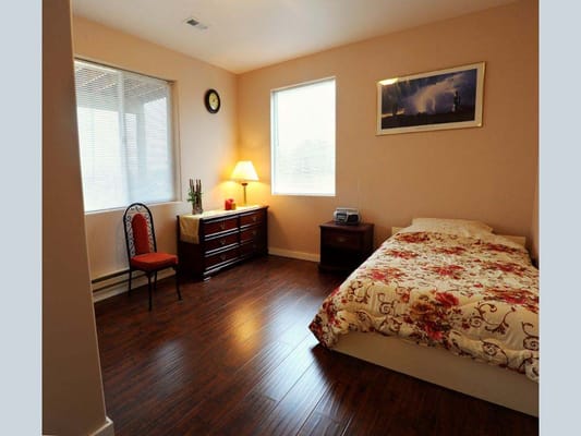 Cozy private room with a bed and window