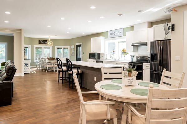Bright, spacious kitchen area with seating