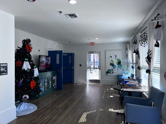 A decorated common area with Halloween themes