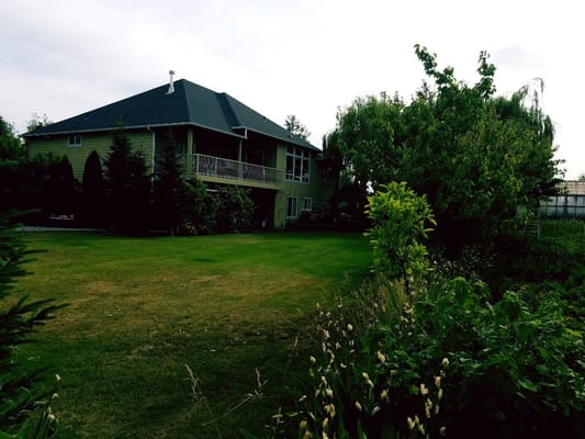 Exterior view of a nursing home with greenery