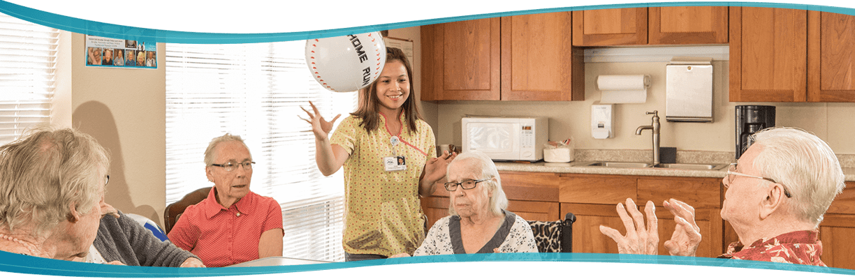 Residents participating in an engaging activity in the common area