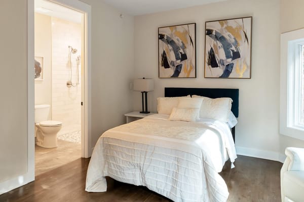 Cozy resident room with elegant decor and ensuite bathroom