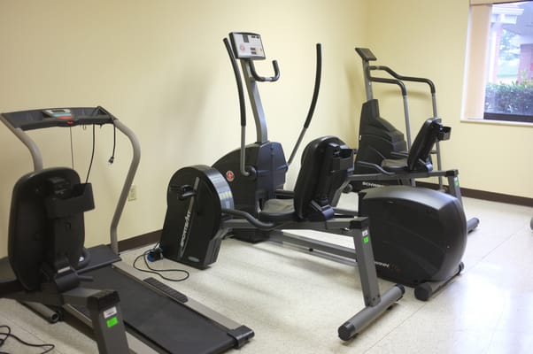 Fitness equipment in a well-lit interior space