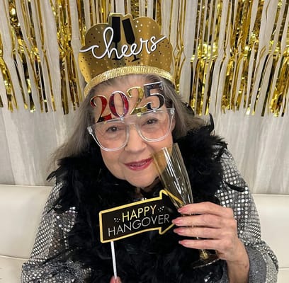 Senior resident celebrating New Year's with festive attire