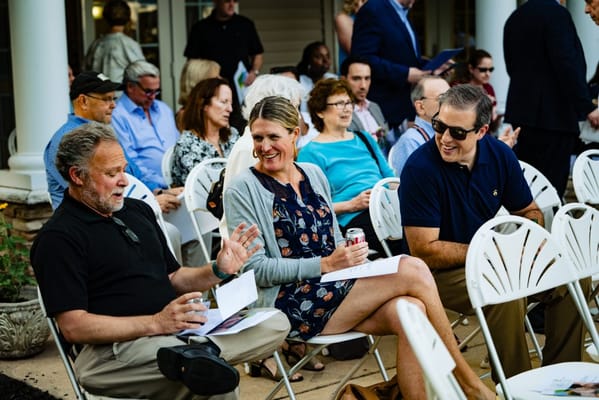 Residents and staff enjoying a community event outdoors