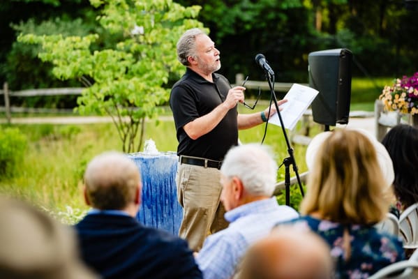 Outdoor gathering with residents enjoying an event