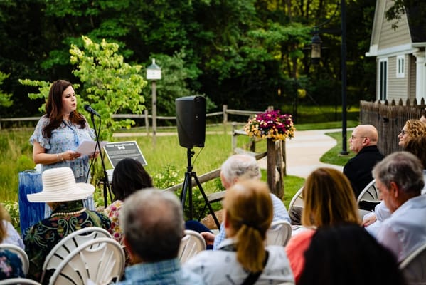 A community gathering in an outdoor setting