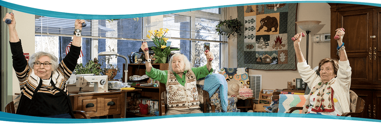 Residents exercising with weights in a common area