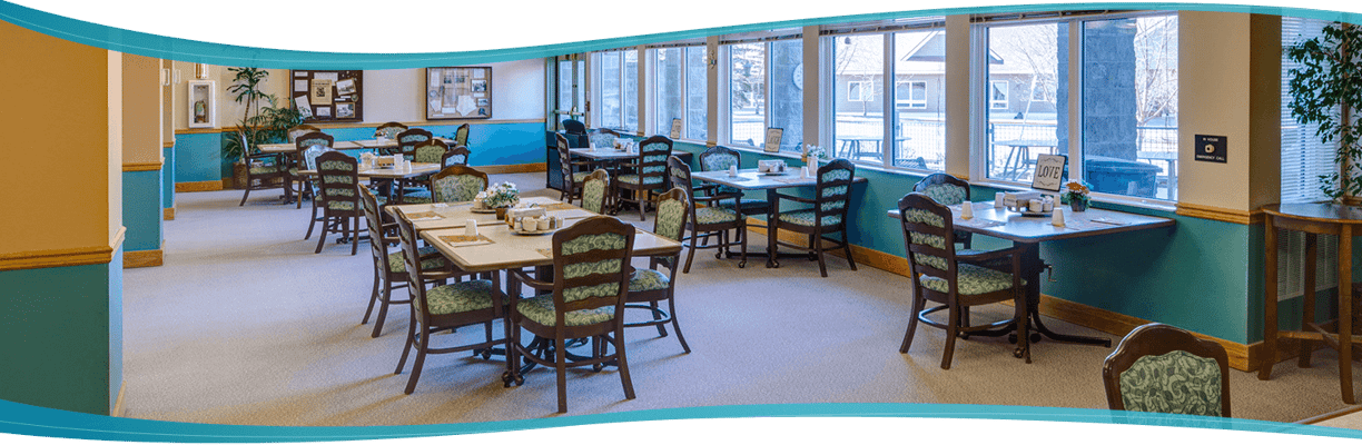 Bright dining area with tables and chairs