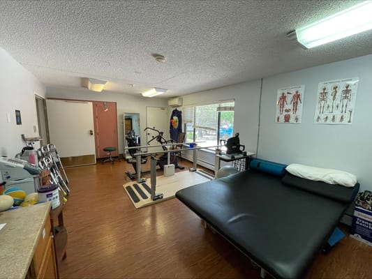 Therapy room with equipment and exercise space