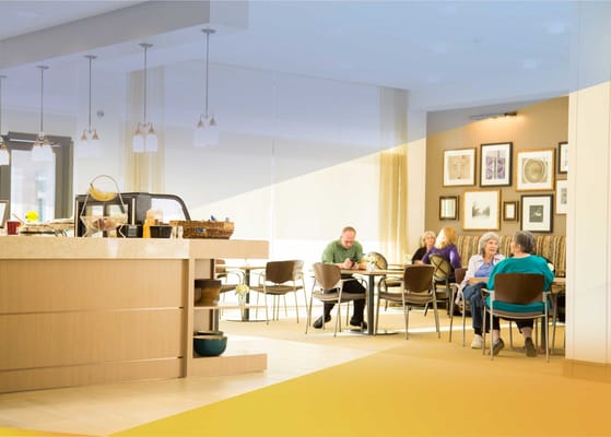 Residents enjoying a meal in a dining area