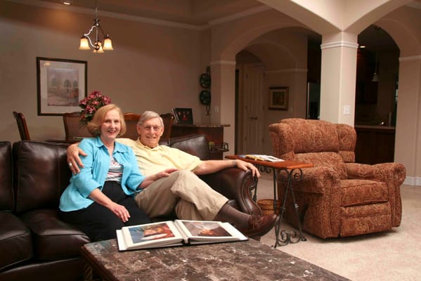Couple sitting together in a cozy living room setting