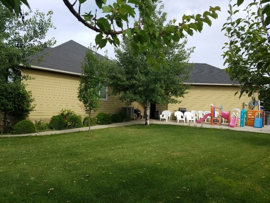 Exterior view of a facility with outdoor seating