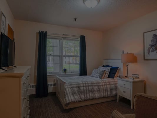 Cozy resident bedroom with natural light