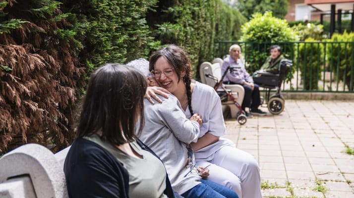 Residents enjoying time together in a garden area