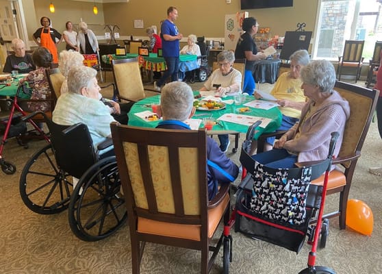 Residents enjoying a social activity in the common area