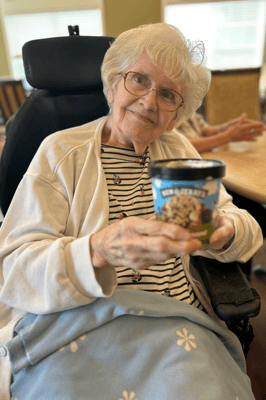Resident enjoying ice cream in a common area