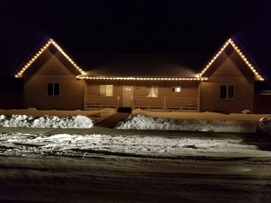 Exterior view of a senior care facility at night