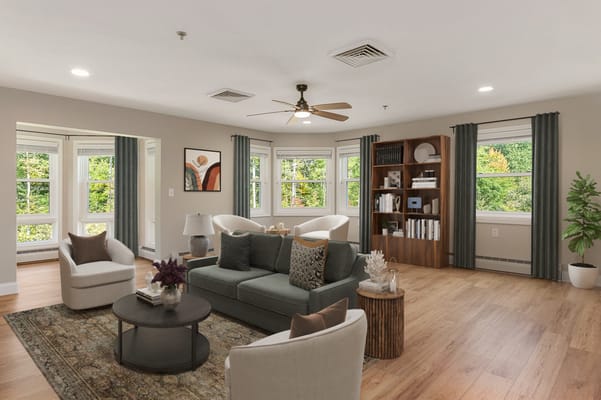 Bright common area with seating and natural light