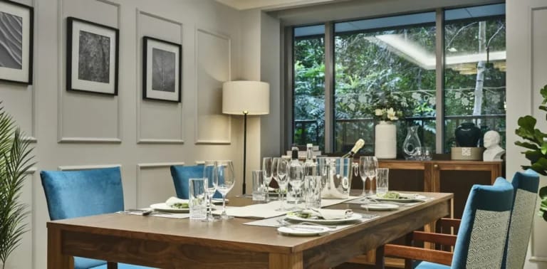 Elegant dining area with natural light and decor