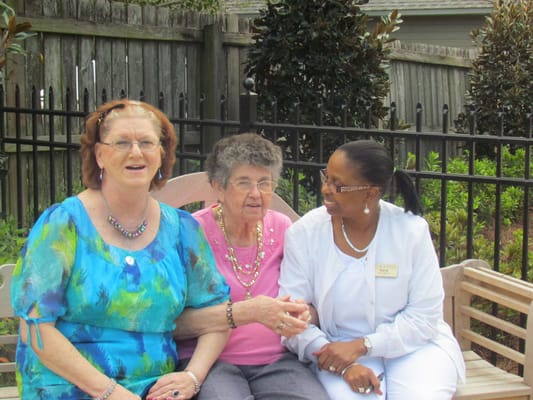 Residents and staff enjoying time together outdoors