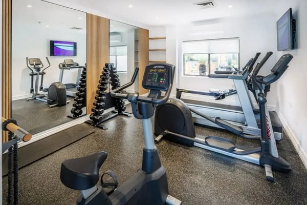Interior view of a fitness room with exercise equipment
