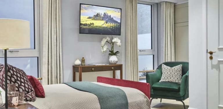 Warm and inviting resident room with modern decor