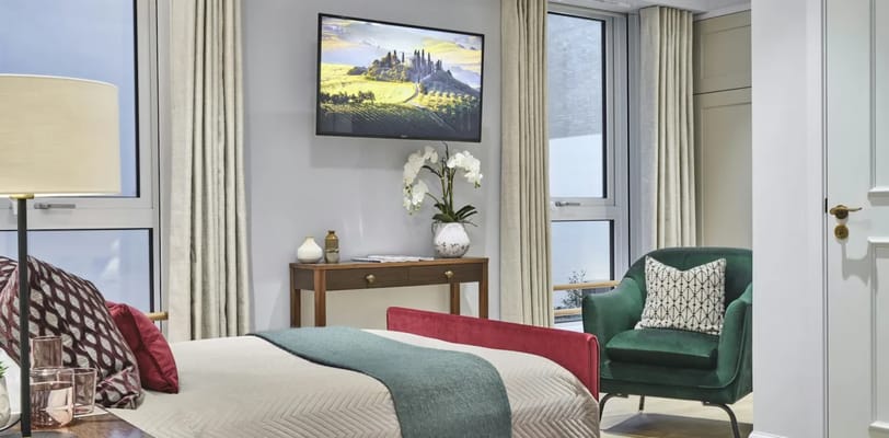 Warm and inviting resident room with modern decor