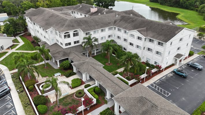 Aerial view of The Bridge at Orlando showcasing the building and landscaped grounds.