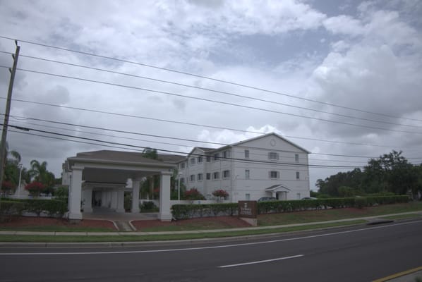 Exterior view of The Bridge at Orlando senior living facility.