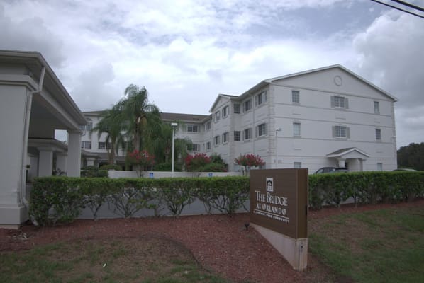 Exterior view of The Bridge at Orlando with landscaping