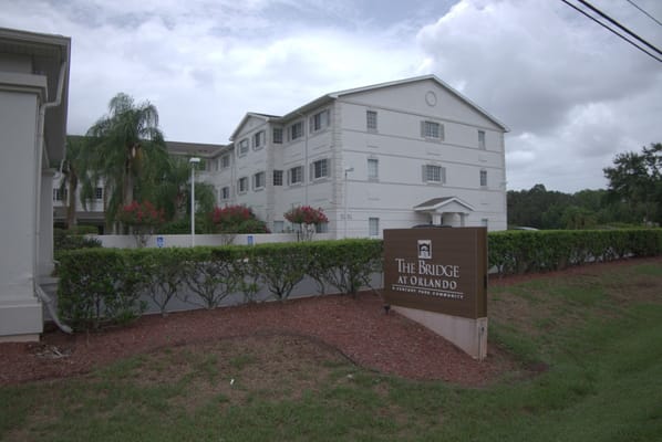 The Bridge at Orlando facility exterior with sign and landscaping