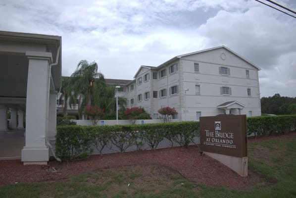 Front view of The Bridge at Orlando senior living facility.