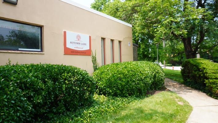 Building exterior with sign for Autumn Lake Healthcare at Homewood Center.