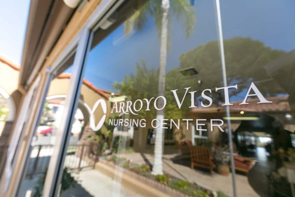 Facility logo on glass entrance