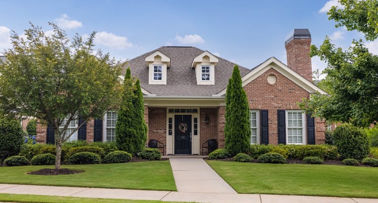 Exterior view of a residential building with landscaping