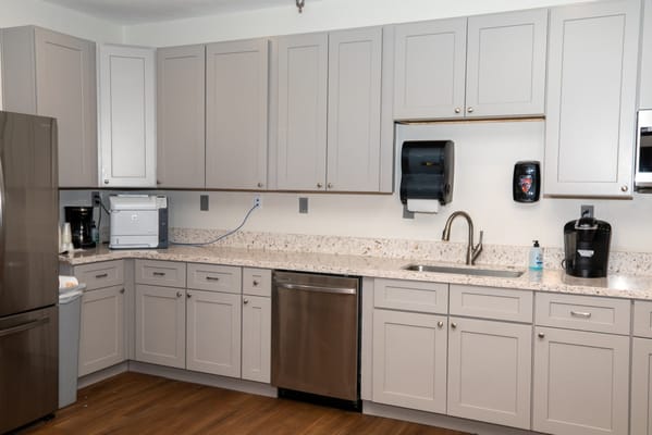 Modern kitchen interior with cabinets and appliances