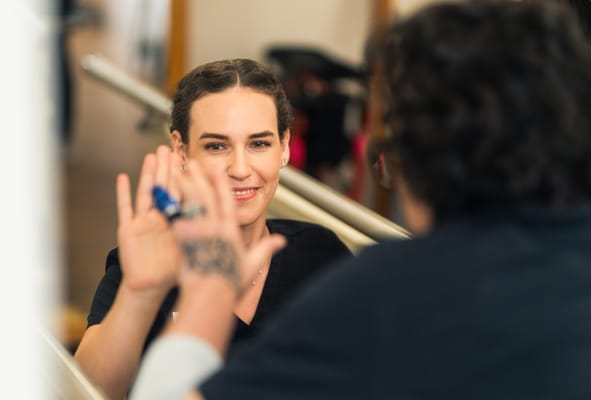 Therapist interacting with a resident during therapy